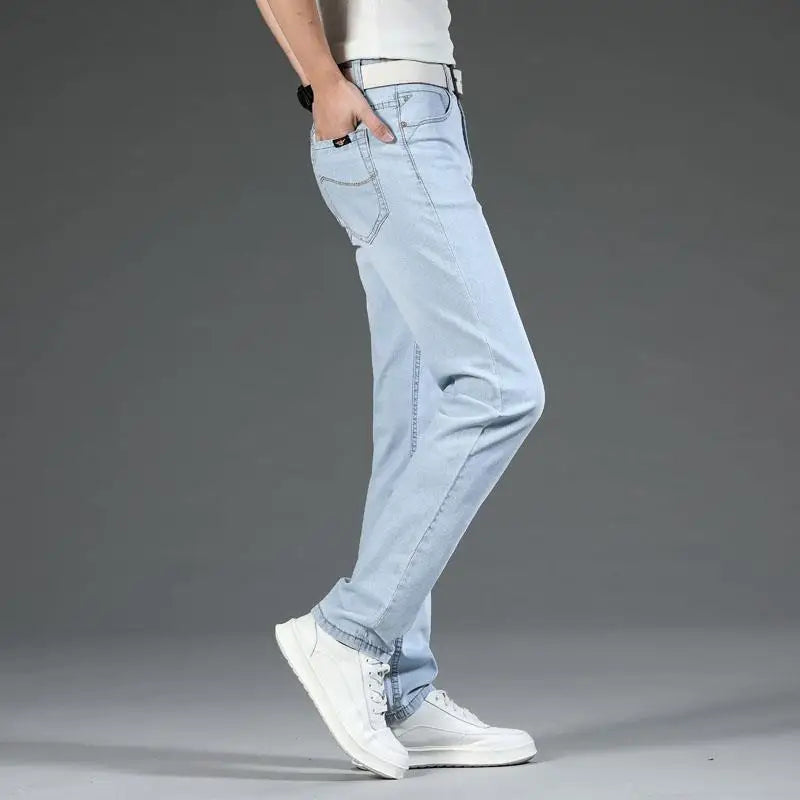 Man in comfortable blue stretch denim jeans, highlighting flexibility and classic fit for casual activities.
