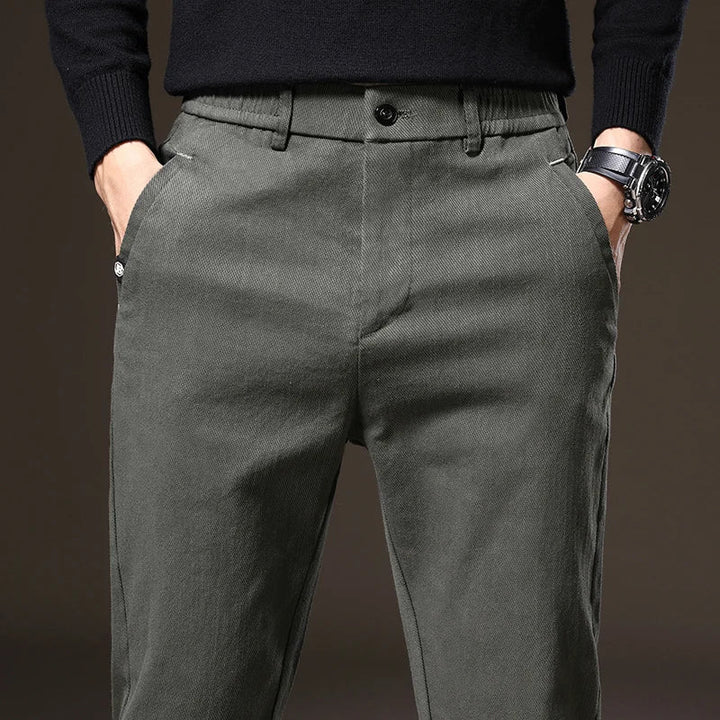 Professional men's stretch dress pants, classic fit silhouette, offering comfort and refined look.