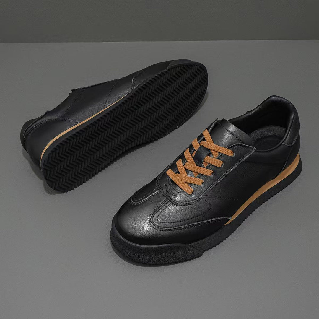 Men's classic genuine leather sneakers for refined style & everyday comfort.