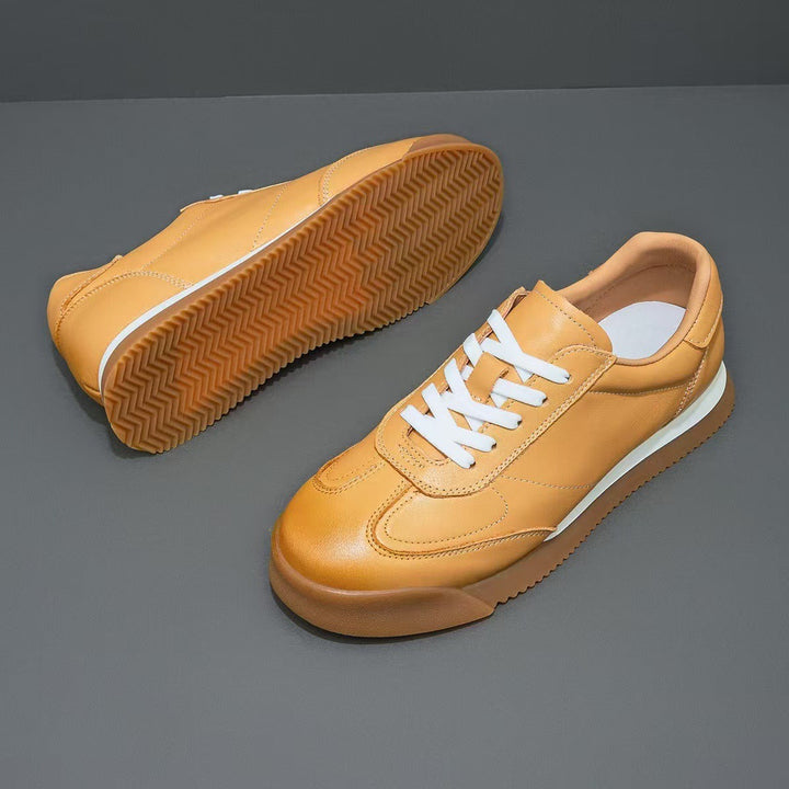 Men's classic genuine leather sneakers for comfortable, stylish everyday wear.