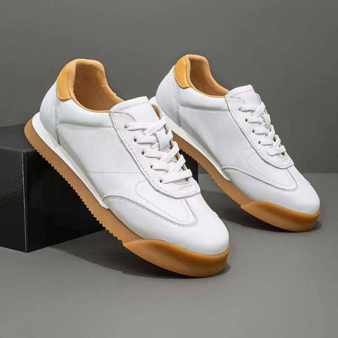 Classic men's genuine leather sneakers, sophisticated footwear for everyday refined style.
