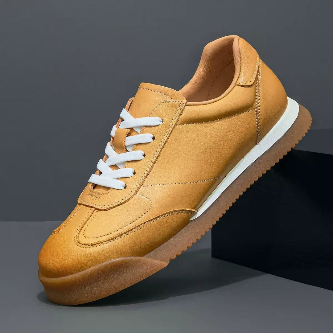 Men's classic genuine leather sneakers in white, black & khaki for refined everyday fashion.