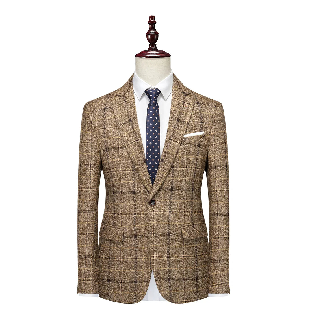 Close-up of a classic men's glen plaid blazer fabric, showcasing the detailed check pattern and quality tailoring.