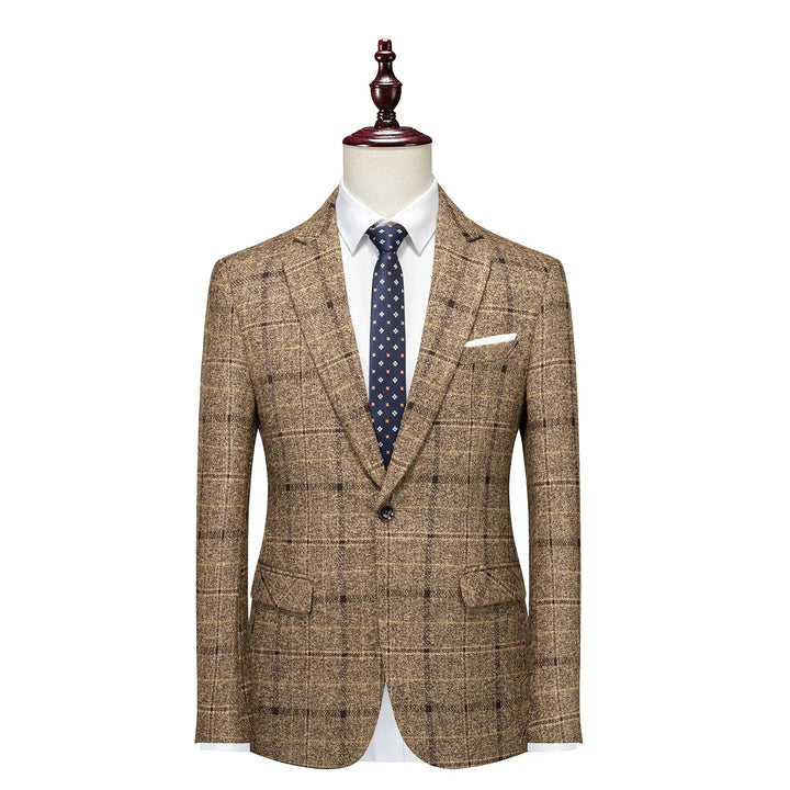 Close-up of a classic men's glen plaid blazer fabric, showcasing the detailed check pattern and quality tailoring.