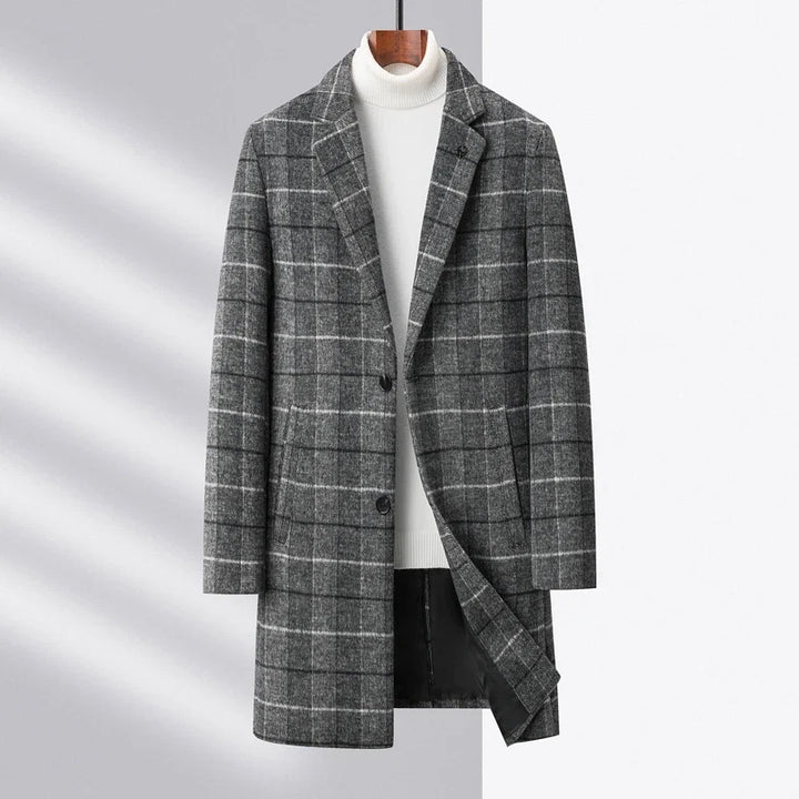 Elegant structured men's tailored fit plaid coat in blue, classic sophisticated outerwear.