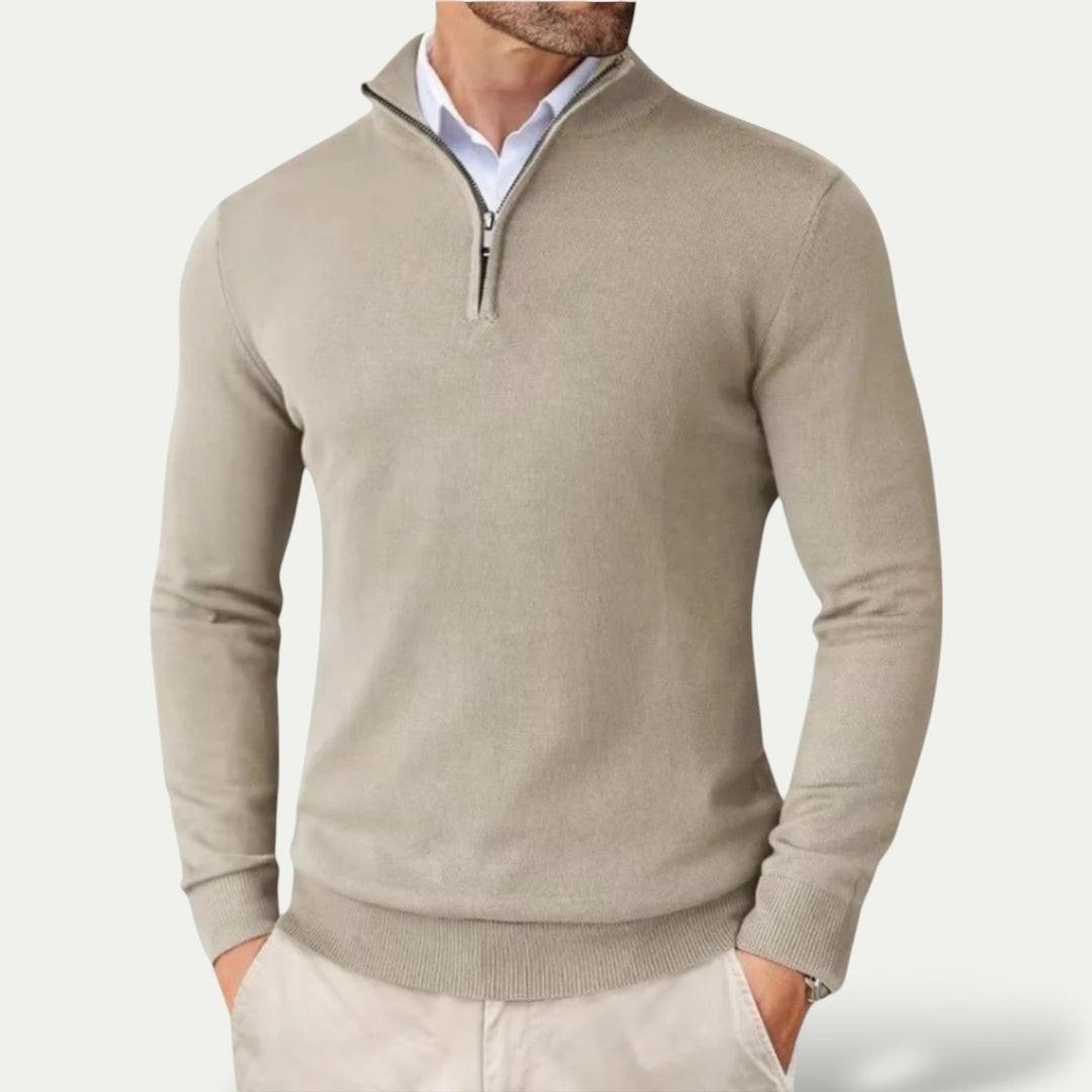 Close-up of a men's half-zip pullover, showcasing the fabric texture and quality design.