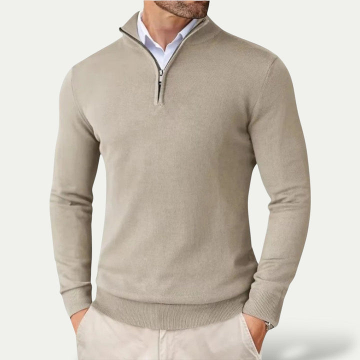 Close-up of a men's half-zip pullover, showcasing the fabric texture and quality design.