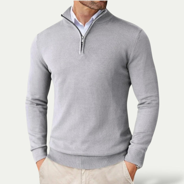 Fashionable men's half-zip long-sleeve top, offering warmth and style for year-round layering.