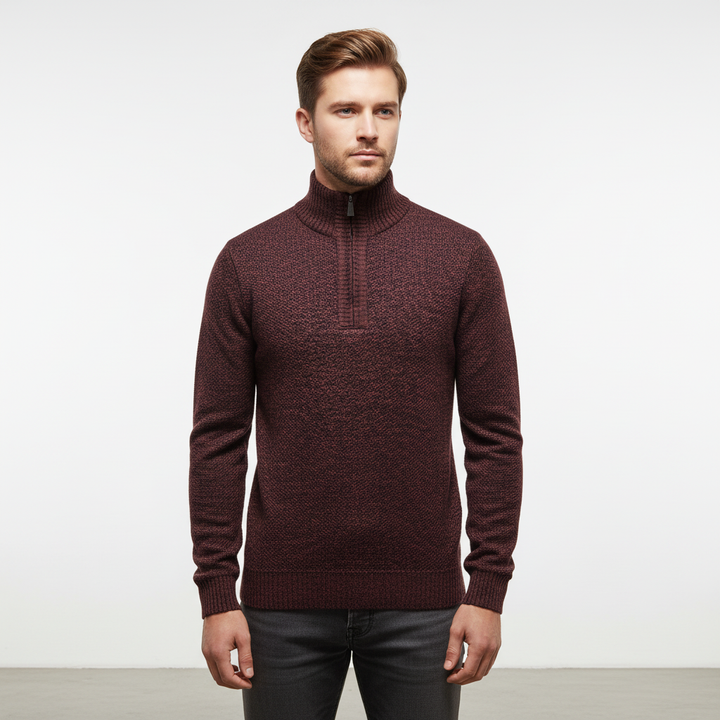 Folded men's half-zip pullover sweater, showcasing the soft cotton blend fabric and quality construction