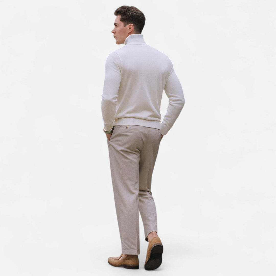 Men's modern half-zip sweater, an essential for layering. Provides a polished smart casual look and comfort.