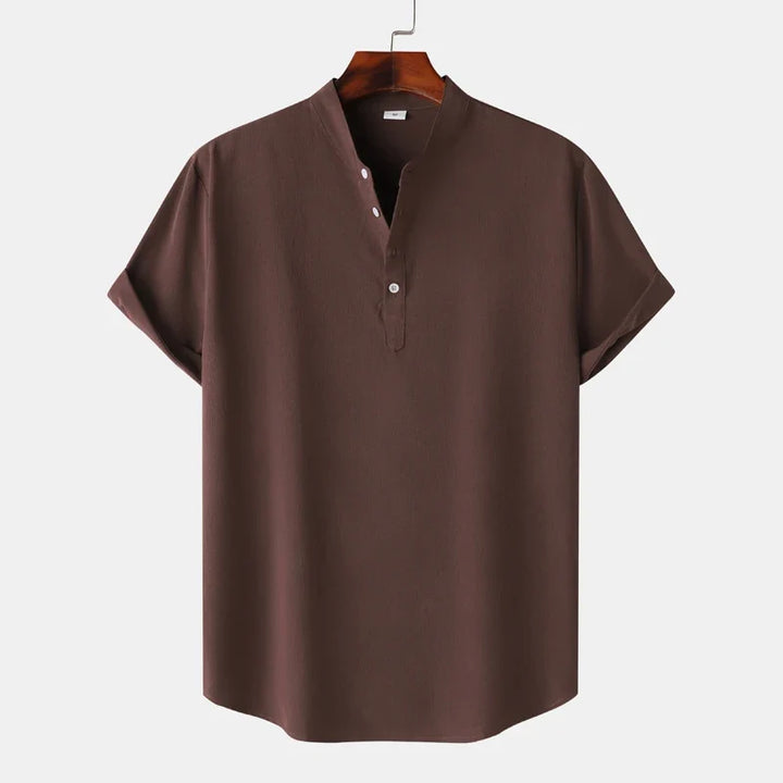 Man wearing a Henley Shirt: Everyday fashion, comfortable men's top with classic style.