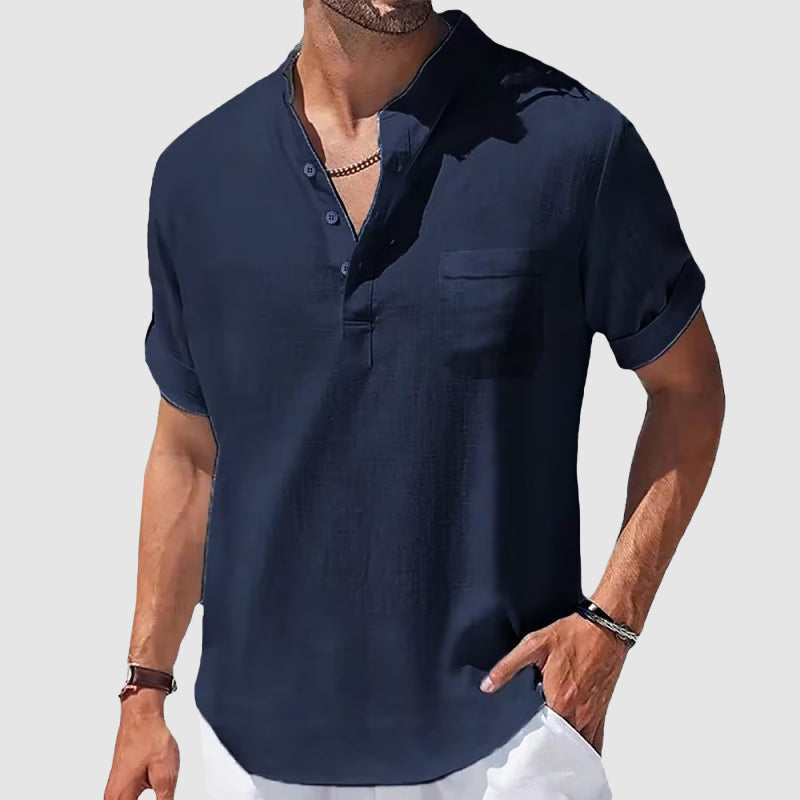 Men's classic Henley shirt in soft, lightweight fabric. Versatile for everyday casual wear.