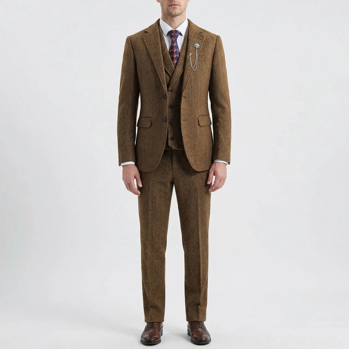 Back view of a tailored fit men's herringbone 3-piece suit, demonstrating classic formal wear.