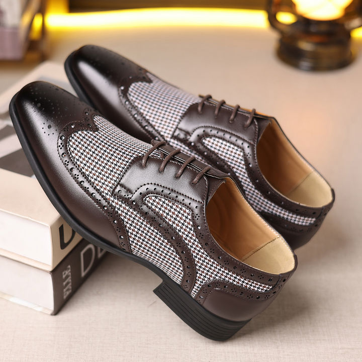 Elegant men's houndstooth dress shoes, combining oxford style with sophisticated wingtip detailing.