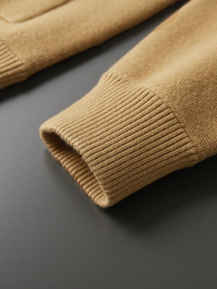 Timeless men's classic knit cardigan sweater in sandstone beige. Button-front, polo collar, elegant layering piece.