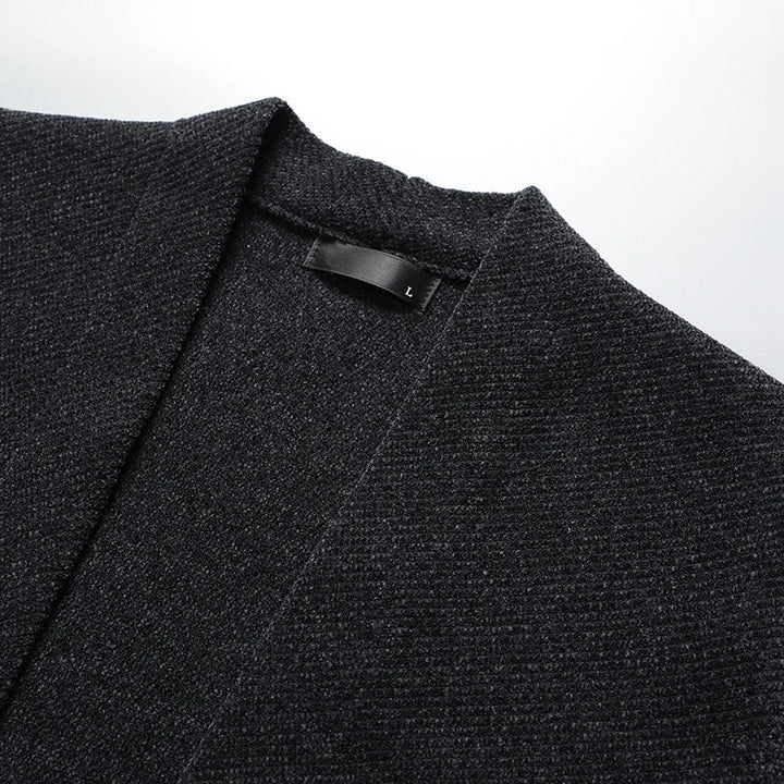 Dark gray men's knit cardigan, classic stripe detail. Versatile layer for men's fall & winter fashion.