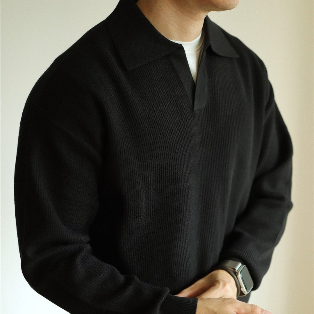 Front view of a timeless men's classic knit polo. A versatile short-sleeve top for everyday fashion.