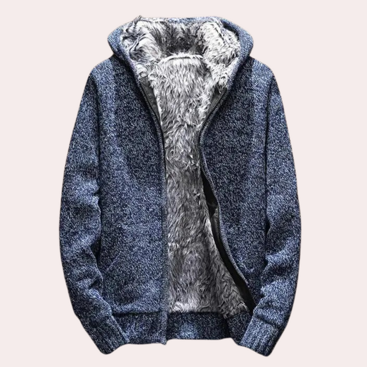Close-up of classic knitted hooded gilet texture. Men's stylish sleeveless jacket, showcasing quality and detail.