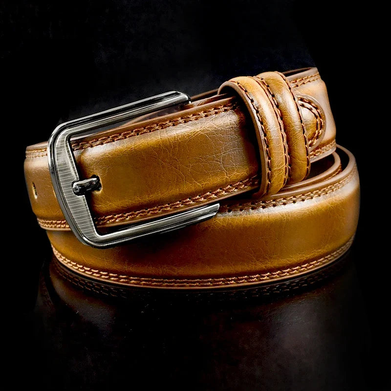 Versatile camel men's leather belt, a durable accessory with a chic brushed silver buckle for modern style.