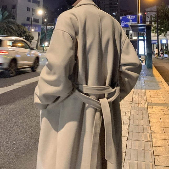 Stylish men's long trench coat, a versatile belted outerwear piece for elegant autumn & winter fashion.
