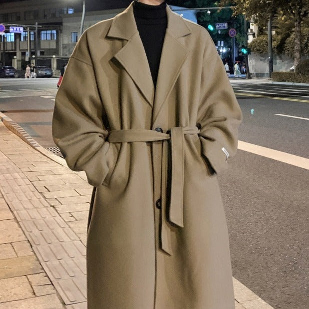 Timeless men's tailored long overcoat with a flattering belted design, suitable for classic smart casual looks.