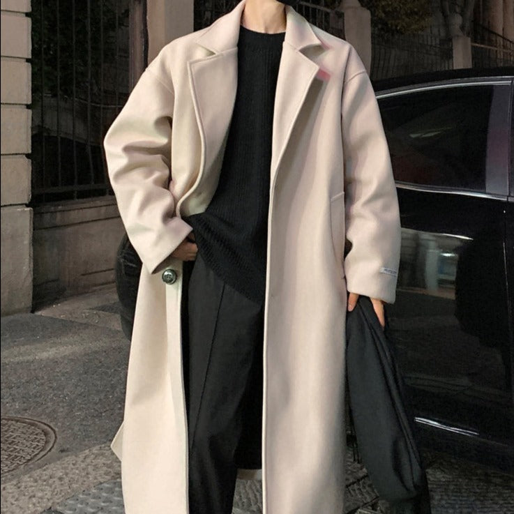 Elegant men's long belted overcoat, a classic trench coat style, ideal for modern men's fashion & outerwear.