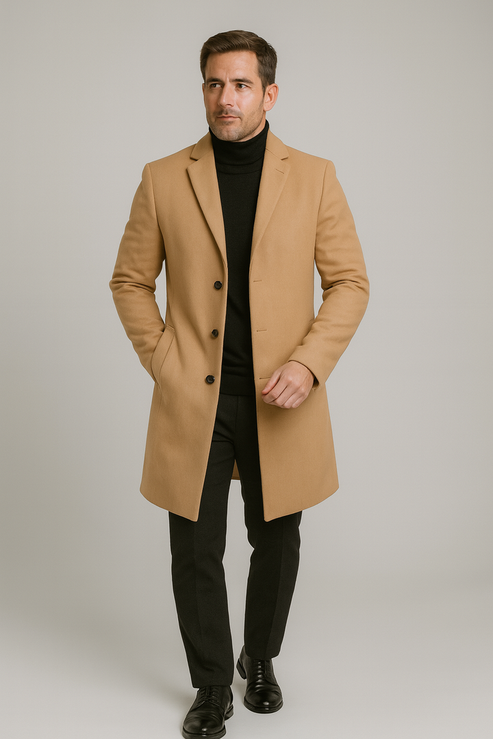 Man wearing a classic long trench overcoat with notch lapel, a smart casual winter fashion statement.