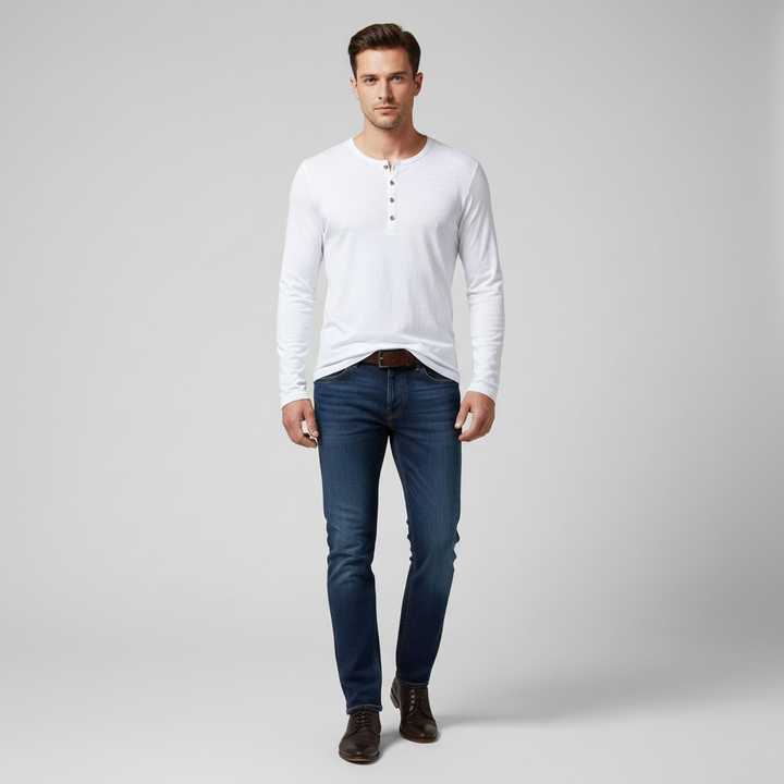 Close-up of the button placket on a men's Theo long sleeve cotton blend Henley shirt.