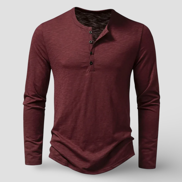 Stylish men's long sleeve Henley shirt featuring a classic button placket for a versatile, casual look.