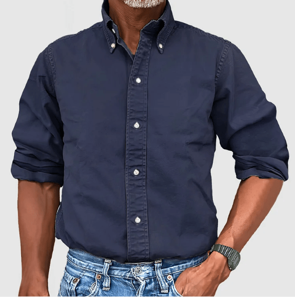 Man wearing a versatile long sleeve shirt, perfect for both office and casual outings. Classic style.