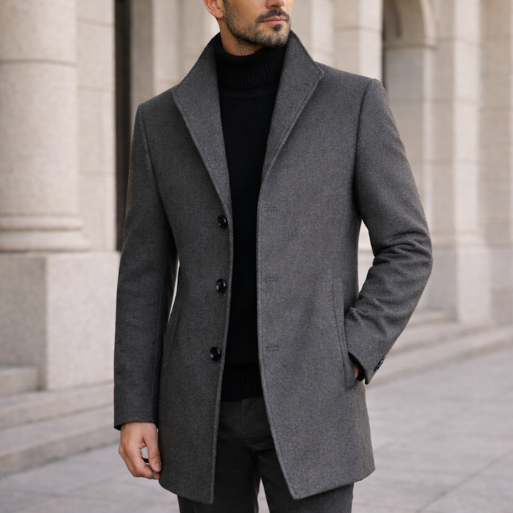 Sophisticated men's long winter coat, warm & durable for formal or business wear.