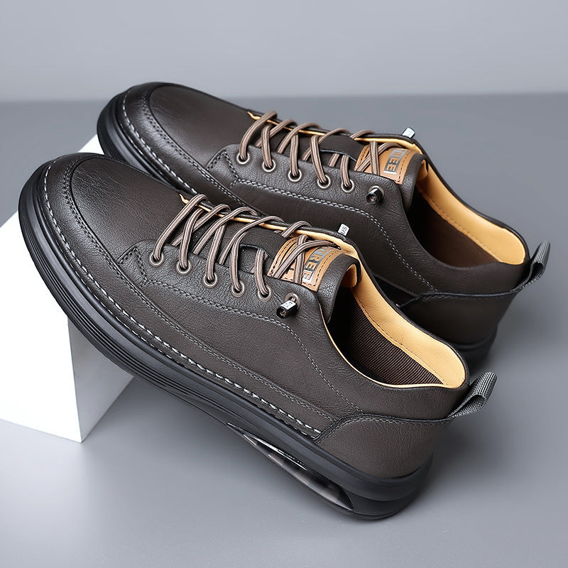 Stylish men's casual sneakers with a classic low-top design and comfortable fit.