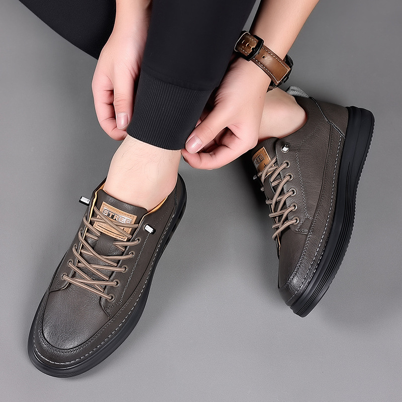 Classic men's lace-up low-top sneakers, offering comfort and style for casual outings.