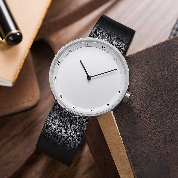 Stylish men's classic Roman numeral watch, featuring a durable black leather band and sleek design.