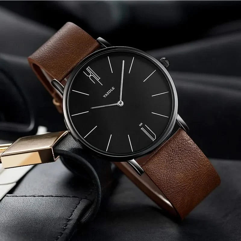 Men's classic minimalist watch with brown leather band, an elegant and sophisticated timeless wristwear.