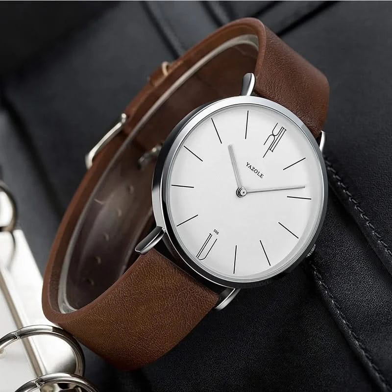 Classic men's elegant watch with a clean white dial and a rich brown leather strap, sophisticated accessory.