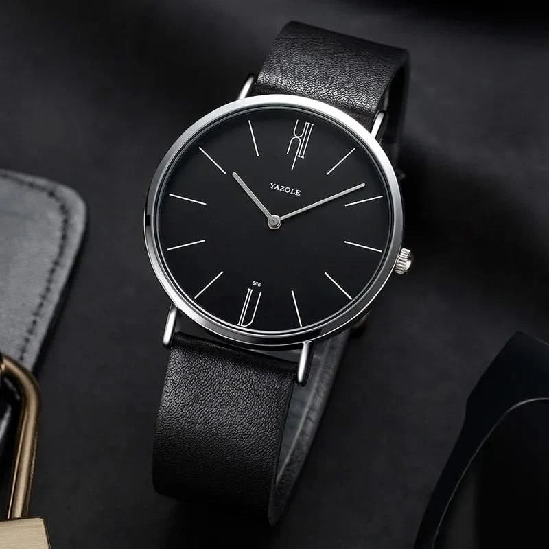 Sophisticated men's classic watch, featuring a durable leather band and simple, elegant face. Versatile.