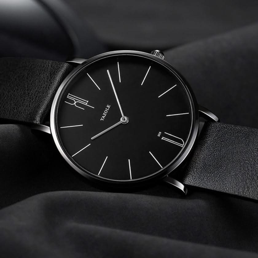 Stylish men's minimalist watch with a black leather band, offering a clean, modern, and elegant look.