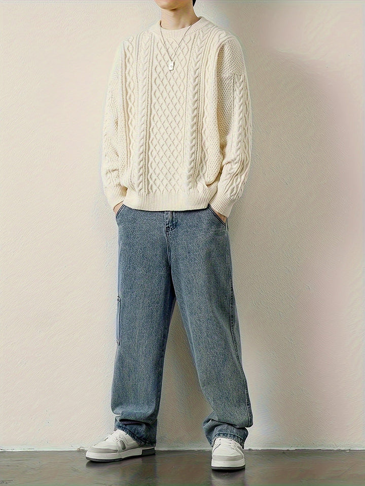 Soft men's cable knit jumper in light grey, a comfortable choice for casual style.