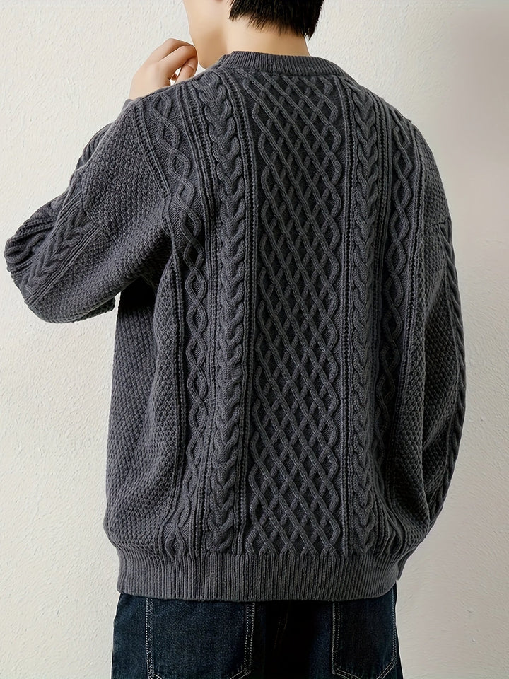 Cozy men's cable knit sweater, essential for comfortable and stylish winter days.