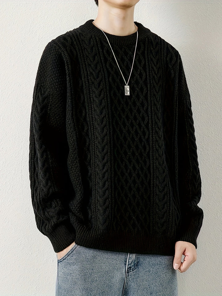 Elegant men's cable knit pullover in charcoal, perfect for a sophisticated winter look.