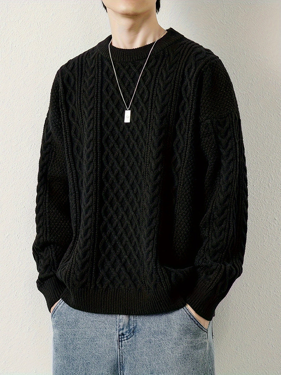 Comfortable men's cable knit sweater, a staple for cozy winter fashion.