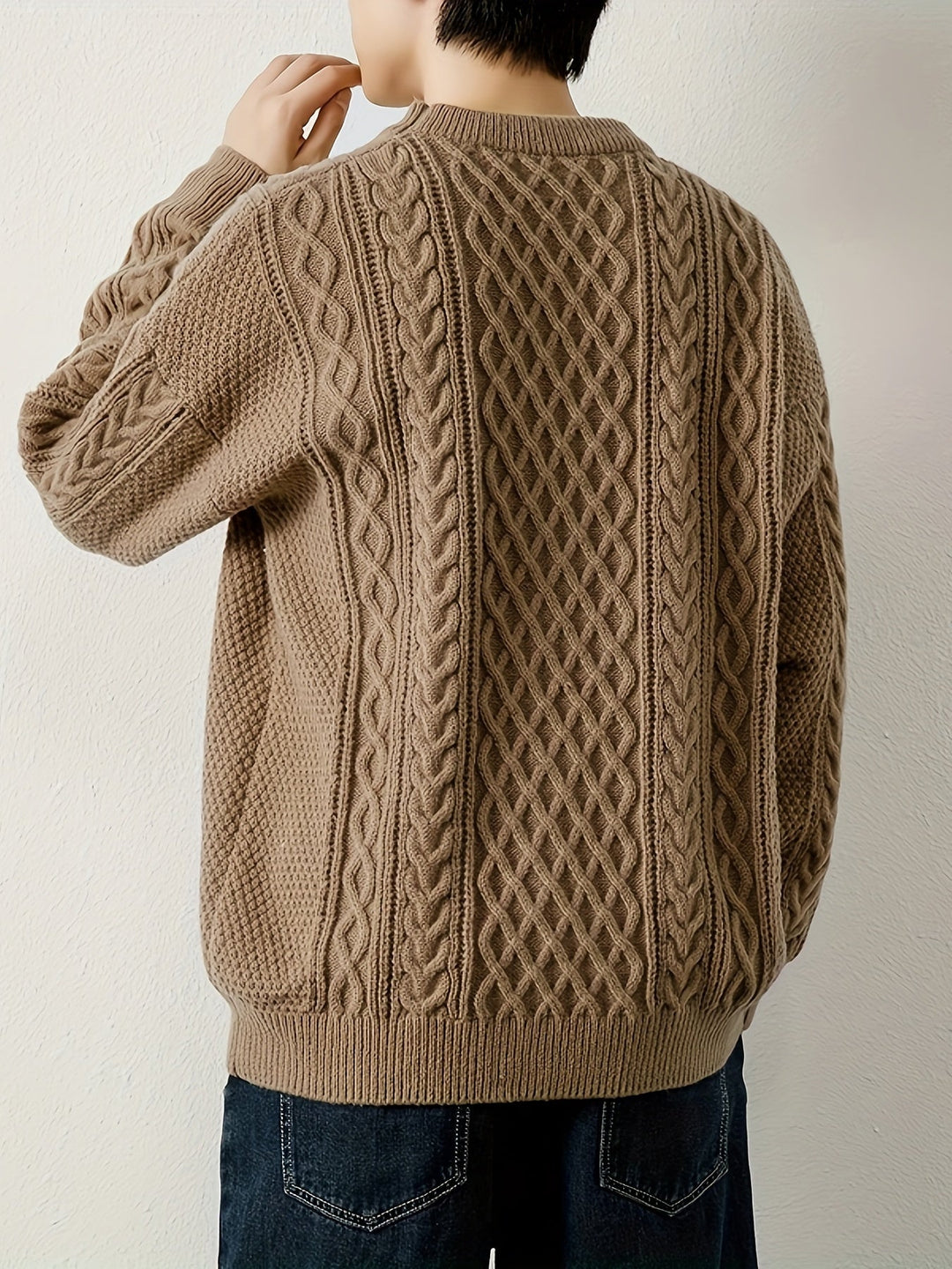 Classic black men's cable knit jumper, versatile apparel for modern winter fashion.