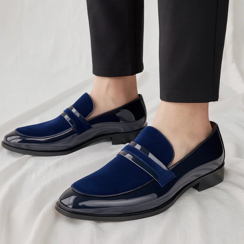 Polished leather men's penny loafers. Sophisticated slip-on shoes for a timeless, versatile look.