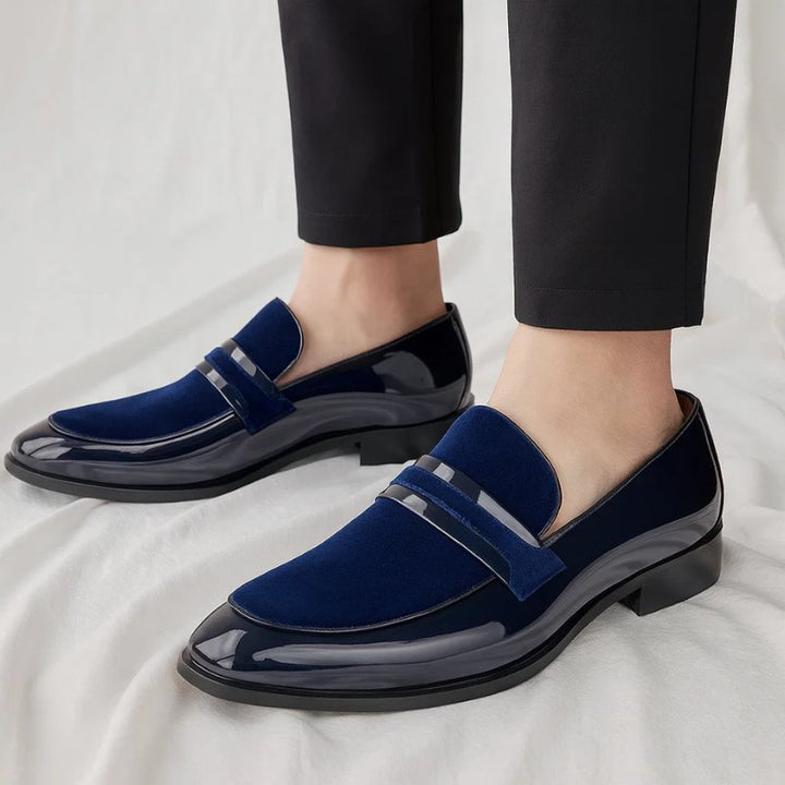 Polished leather men's penny loafers. Sophisticated slip-on shoes for a timeless, versatile look.