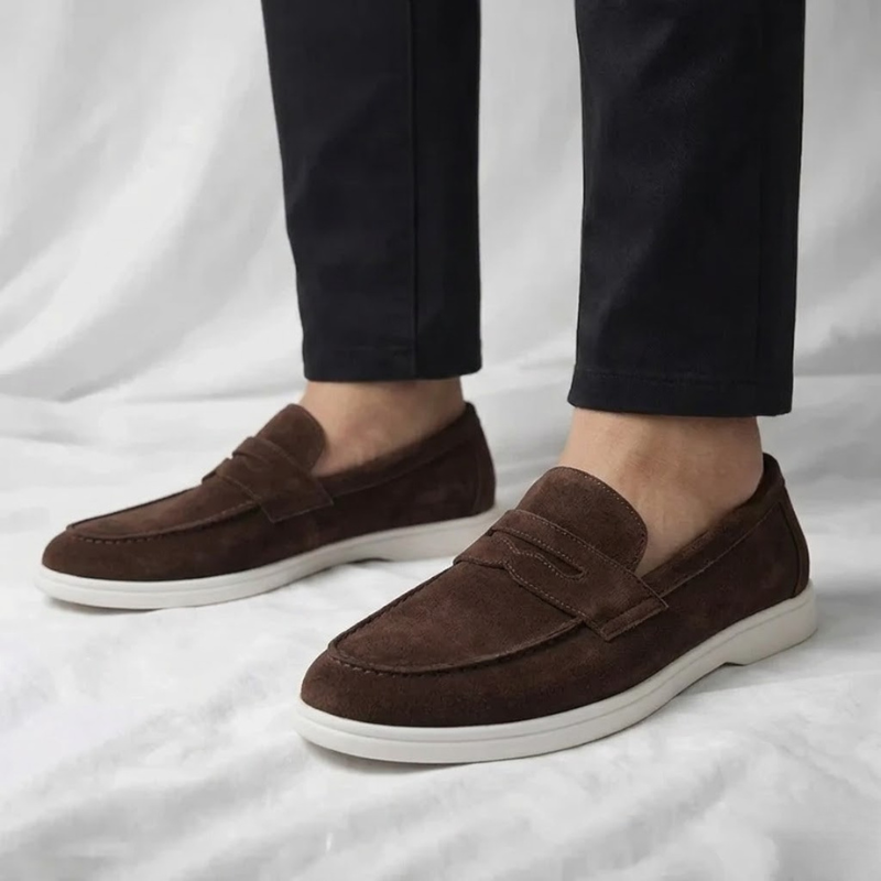 Premium men's penny loafers. Elegant slip-on shoes for sophisticated everyday comfort & style.