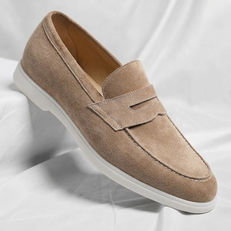 Comfortable sand penny loafers for men. Everyday slip-on casual shoes, perfect for smart fashion.
