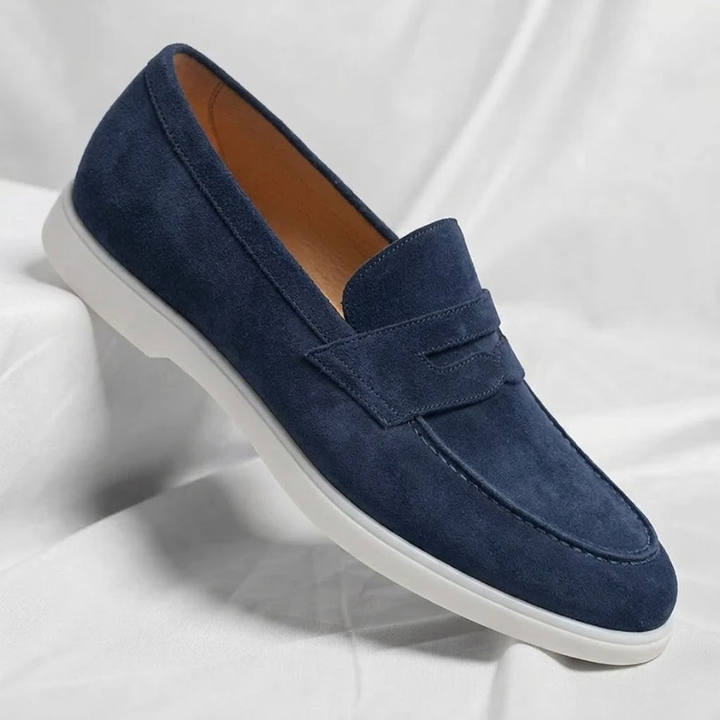 Dark brown men's penny loafers. Everyday comfort footwear for smart casual and dress fashion.