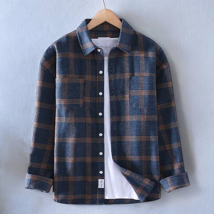 Men's classic plaid button-up shirt, long sleeve for timeless casual style & comfort.