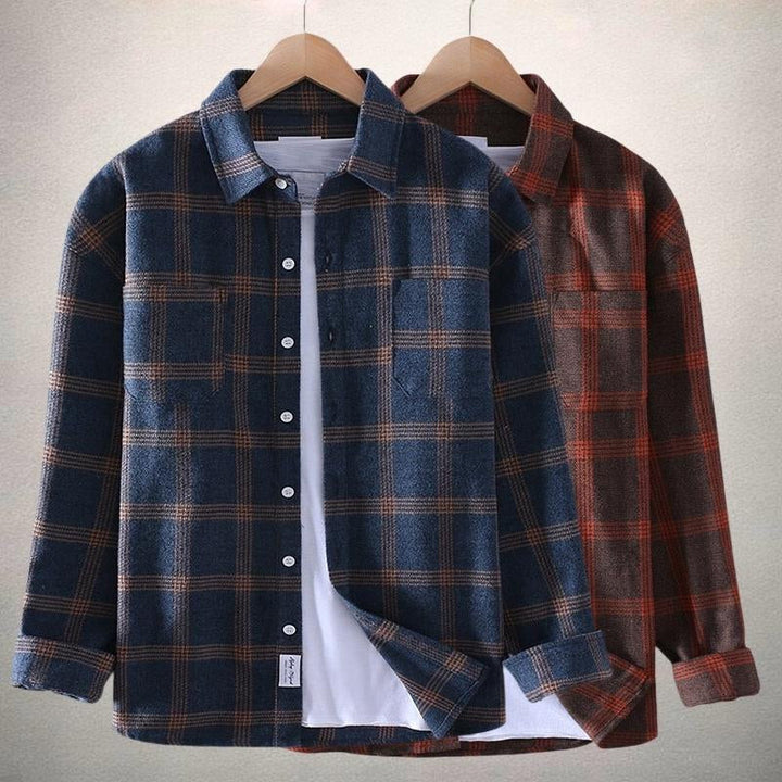 Stylish men's button-up shirt in classic plaid, a comfortable long-sleeve top for casual wear.
